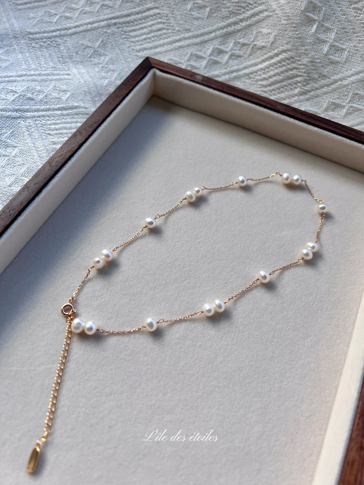 Parure collier et bracelet de perles en étoile