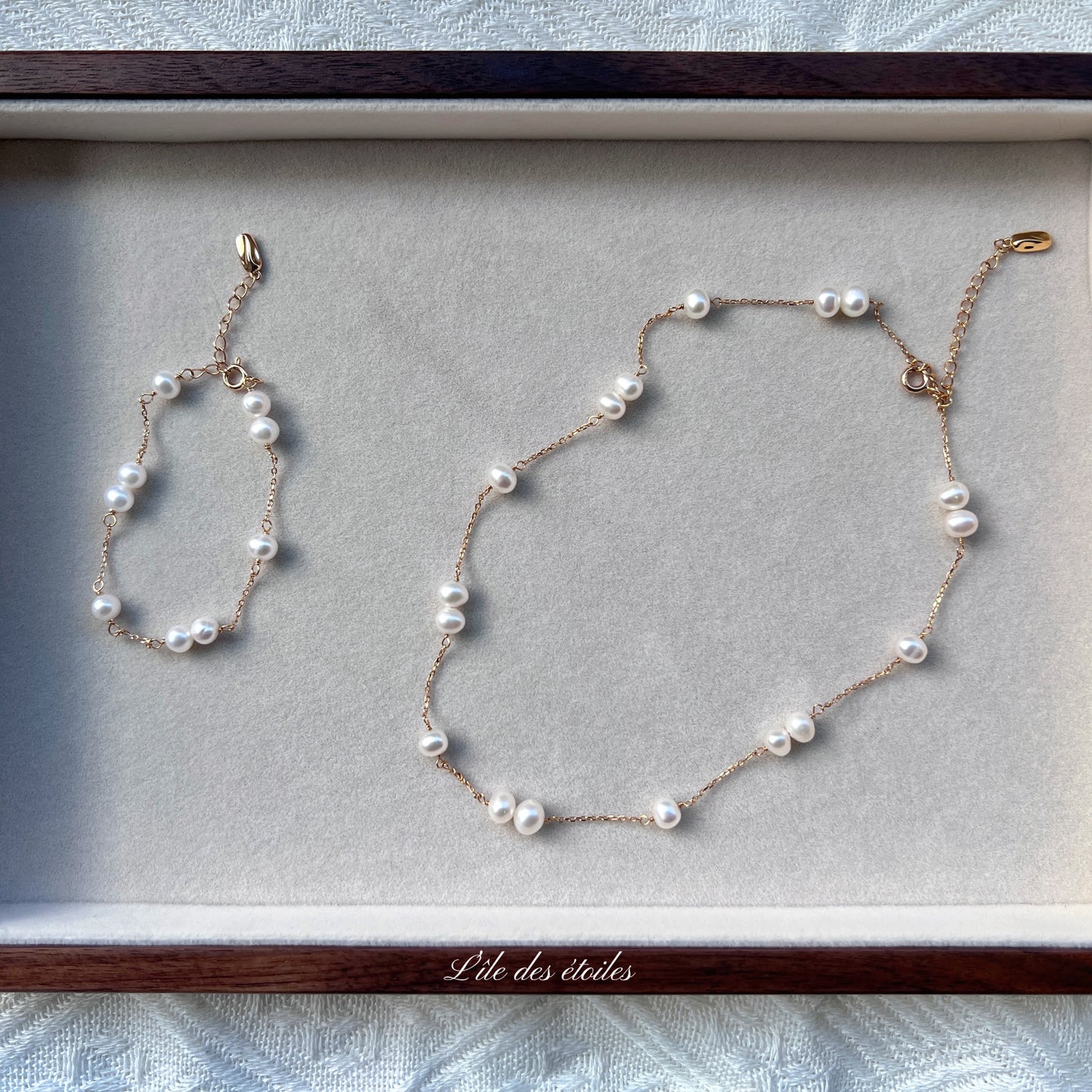 Parure collier et bracelet de perles en étoile