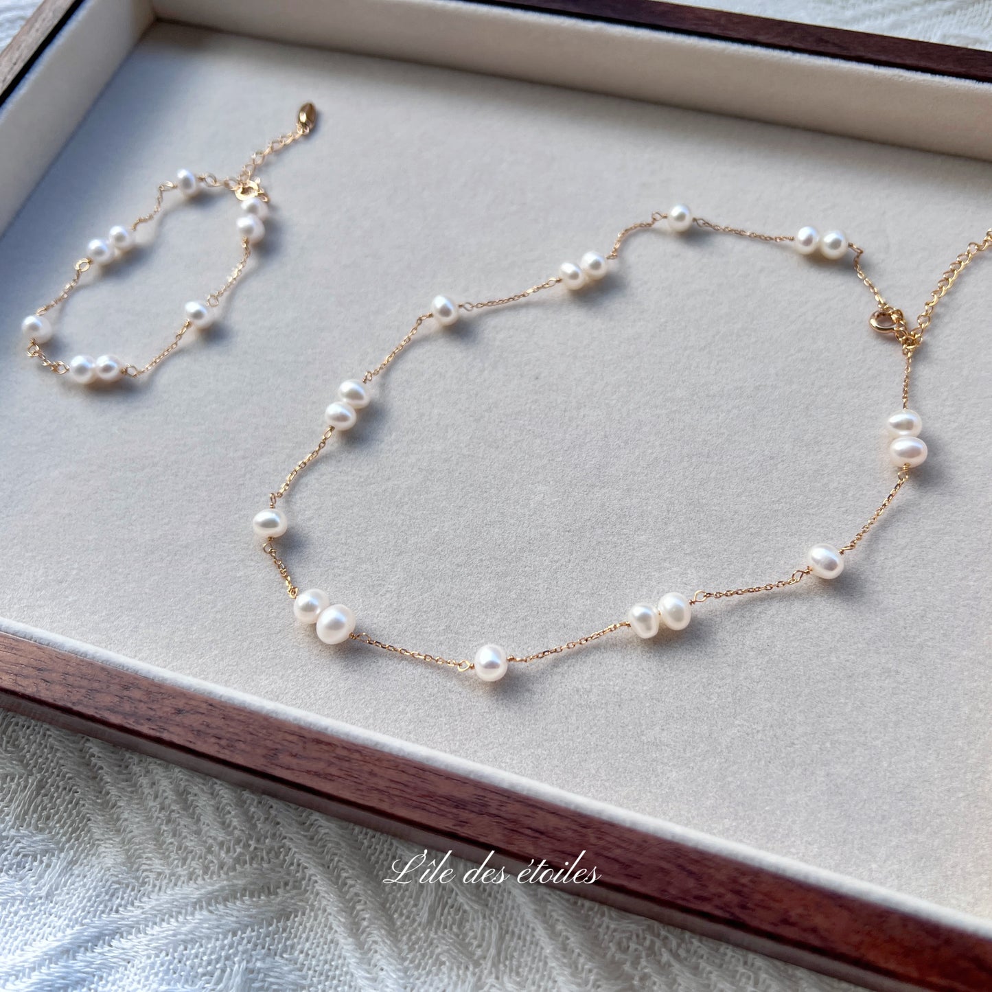 Parure collier et bracelet de perles en étoile