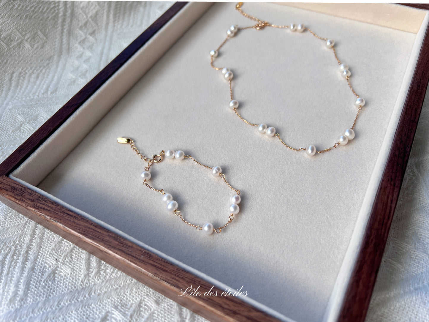 Parure collier et bracelet de perles en étoile