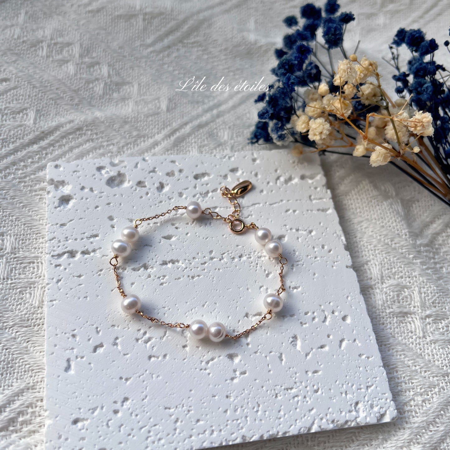 Parure collier et bracelet de perles en étoile